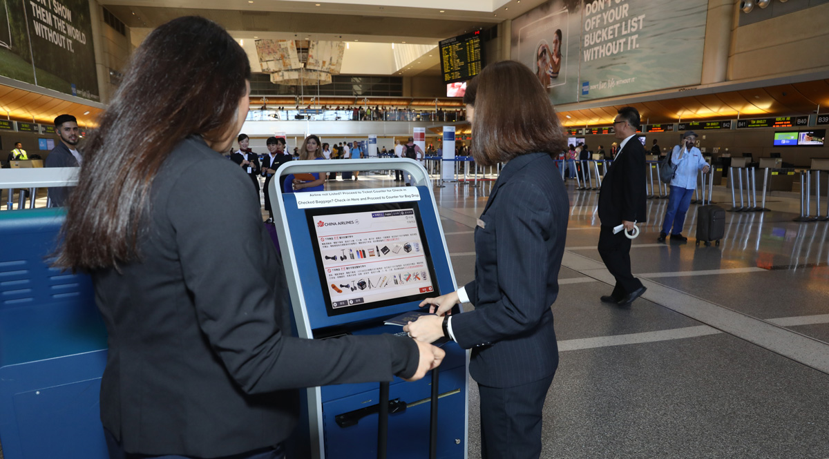 Self-service kiosk at airport terminal